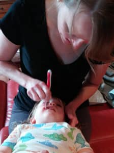 My Toddler Won’t Let Me Brush Her Teeth! What Can I Do?