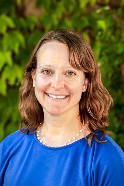 Michelle Kucera, DDS (“Dr. K”)